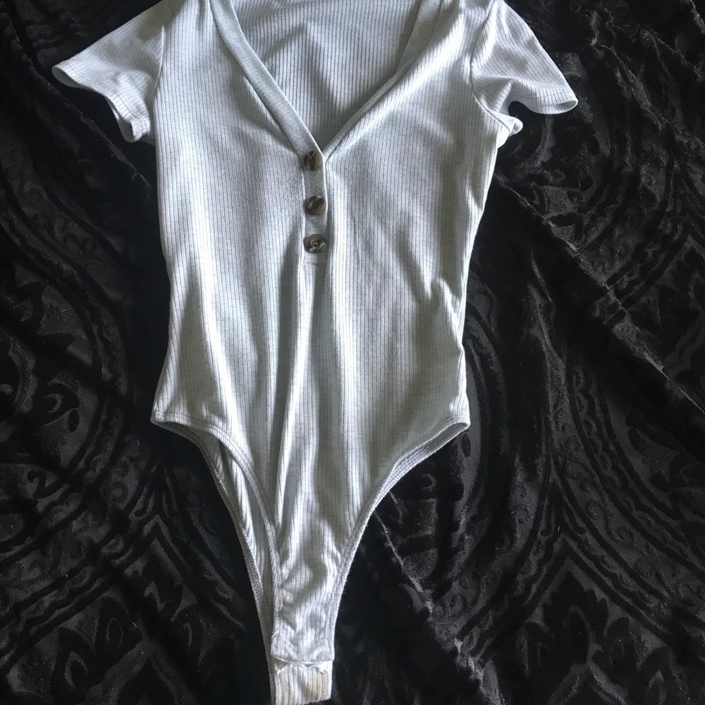 Cute little grey body suit